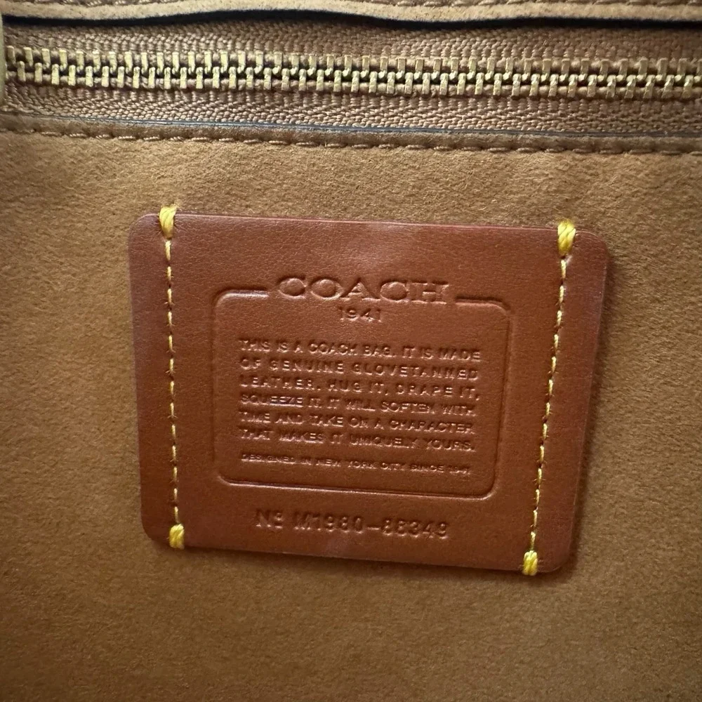 Coach courier hobo